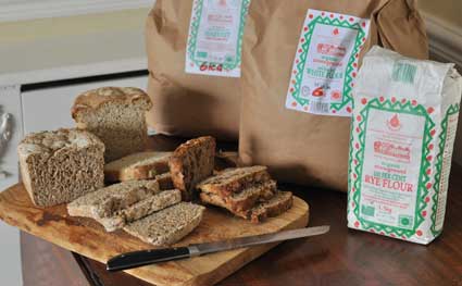 bread made from flour three loaves of bread made from the watermill flour